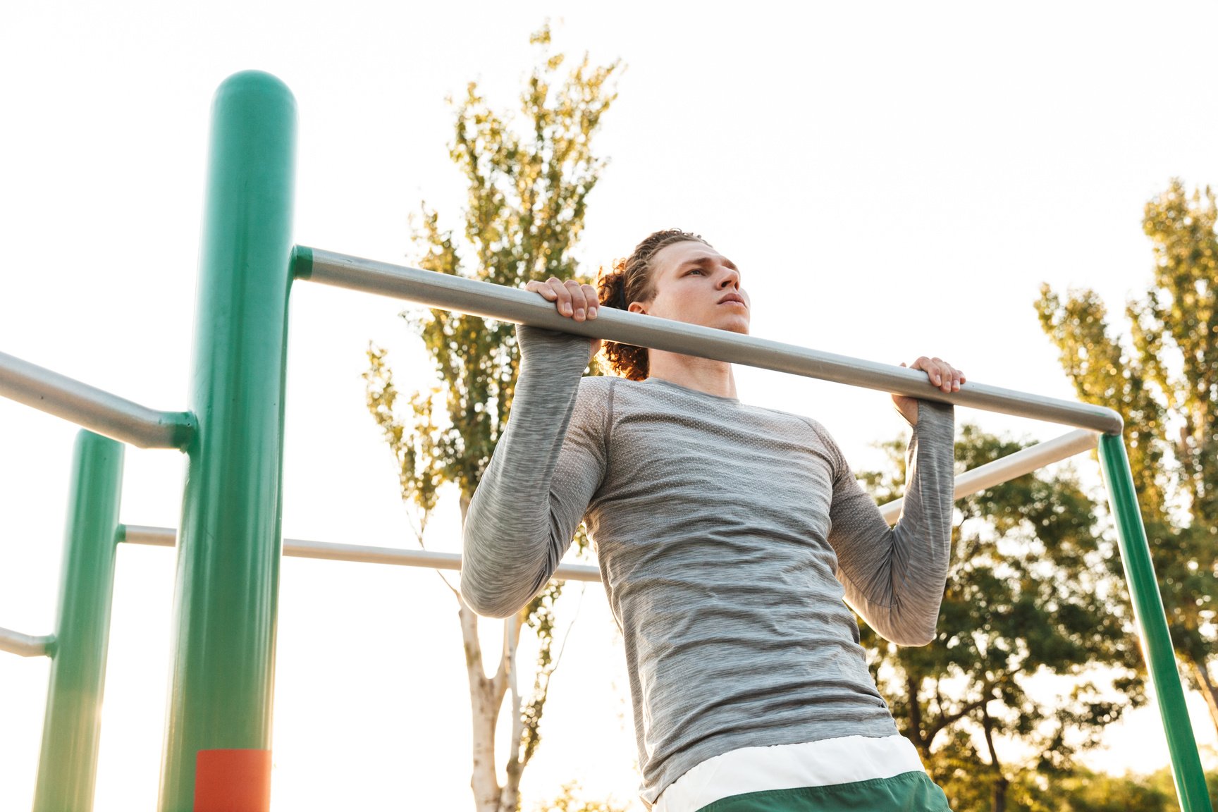 Man Exercising Pull ups 